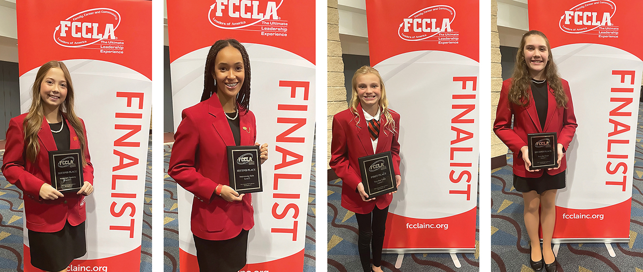 Clark FCCLA Finalists shows four teenage girls in red jackets and holding plaques