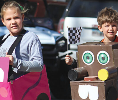 kids wearing cardboard car costumes