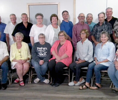 class of 1973 poses for reunion photo