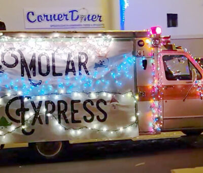 parade of lights van with molar express written on the side