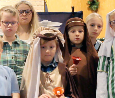 several young children dressed in nativity or nice clothing