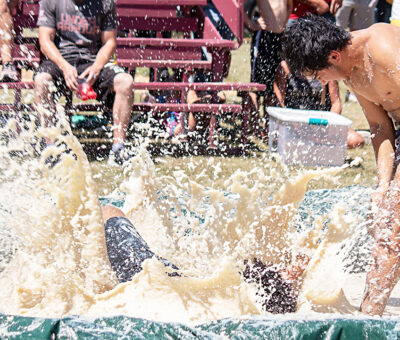 people wrestling in mashed potatoes